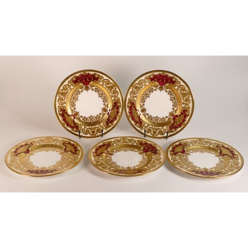 277 - De Lamerie Fine Bone China, five Burgundy Majestic pattern heavily gilt plates. Specially made for A... 