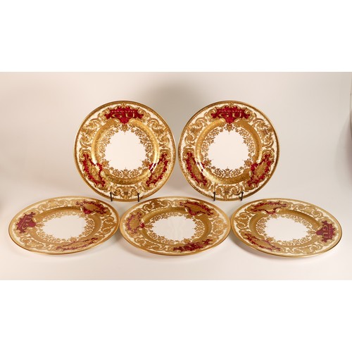 278 - De Lamerie Fine Bone China, five Burgundy Majestic pattern heavily gilt dinner plates. Specially mad... 