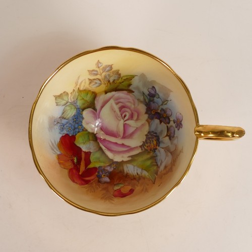 314 - J. A. Bailey for Aynsley, Porcelain tea cup and saucer with interior cabbage rose to cup and saucer.