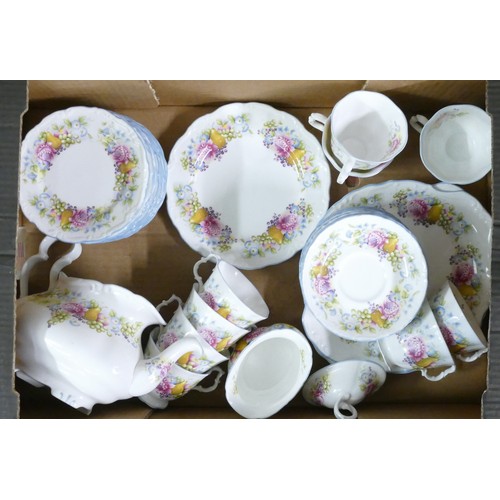 324 - Royal Albert, Summer Garland pattern part tea service. Includes tea pot, twelve side plates, ten sau... 