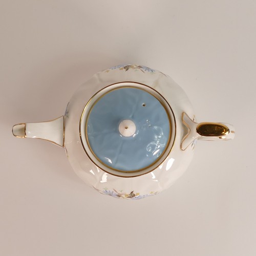 325 - Aynsley Bone China blue Cornflower pattern gilded tea pot, Crocus shape. Height 11cm.