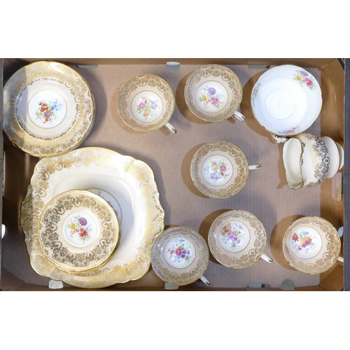 328 - Paragon, 21-piece Floral Spray on peach ground tea set. Comprising bread plate, six trios, milk jug ... 