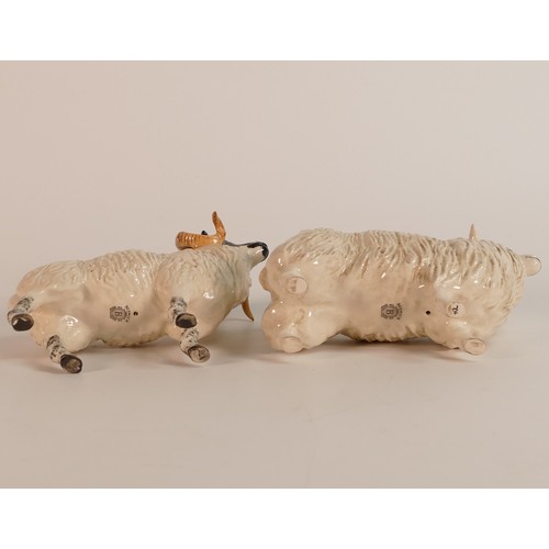 338 - Beswick Boreray Sheep 4124 together with a Cotswold sheep 4122 (H:12cm) (2)