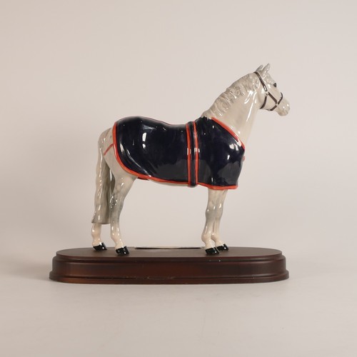 384 - A Beswick (Royal Doulton) Welsh Mountain Pony, A247, wooden base.