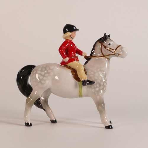 386 - Beswick Girl on grey pony, model 1499, this item decorated off the factory at later date from produc... 