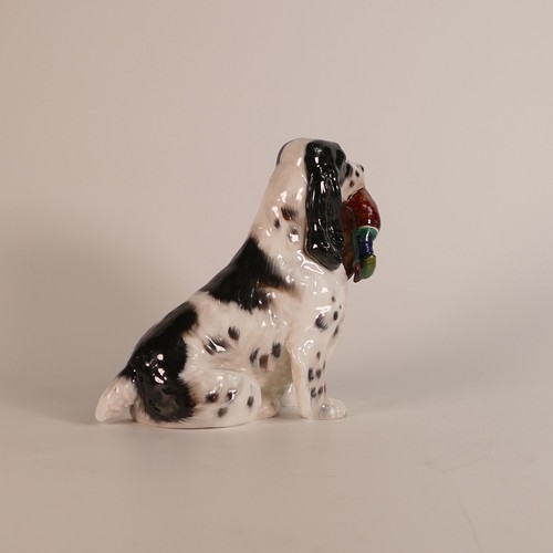 465 - Royal Doulton large model of seated black & white Setter & Pheasant HN1137, h.18cm.