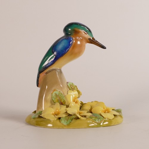 477 - Royal Doulton, early model of Kingfisher on a rock. Additionally mounted on a naturalistic floral ba... 