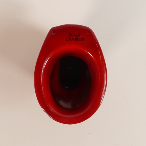 514 - Royal Doulton miniature toilet, salesman's sample in a Flambe red glaze, h.10cm.