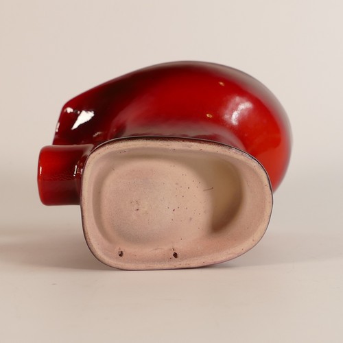 514 - Royal Doulton miniature toilet, salesman's sample in a Flambe red glaze, h.10cm.