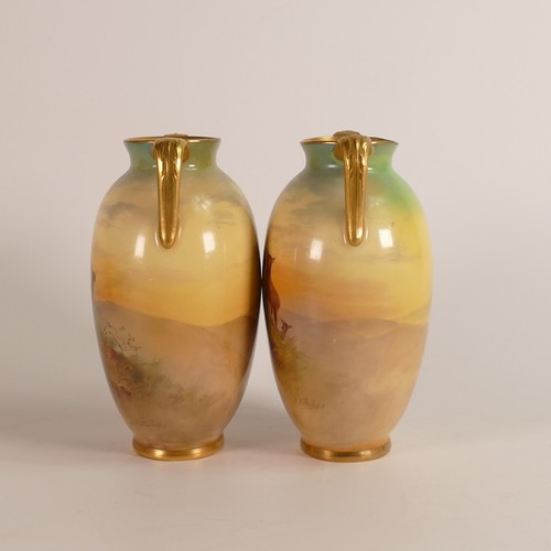 525 - J. A. Phillips for Royal Doulton, pair of hand painted twin handled vases. Painted with highland sta... 