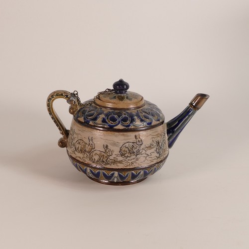 551 - Hannah Barlow for Doulton Lambeth, a Stoneware tea pot, incised decoration all around with rabbits, ... 