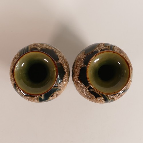 584 - Eliza Simmance for Doulton Lambeth, 
a pair of baluster form vases with tube lined scrolling foliate... 