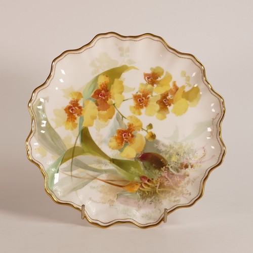 586 - Royal Doulton shaped cabinet plate, gilded and hand painted with Orchids by D.Dewsberry, d.22.5cm to... 