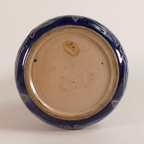 591 - Martha M Rogers for Doulton Lambeth, a bottle form vase decorated with incised urns surrounded by sc... 