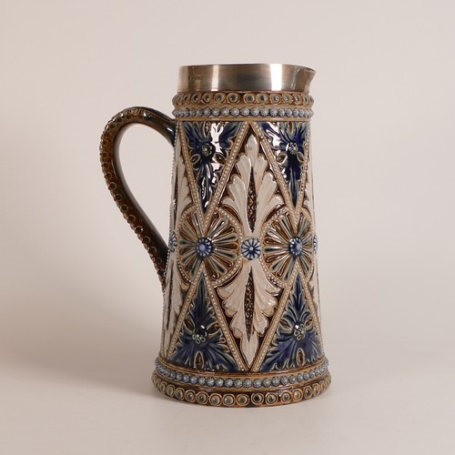 592 - Edith D Lupton for Doulton Lambeth, a lemonade jug decorated with incised floral and leafage with ha... 