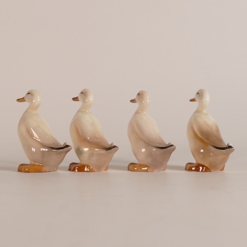 595 - Royal Doulton, four early models of standing ducks. Height: 6cm (4)