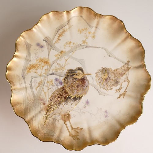 625 - Doulton Burslem, hand painted comport together with three plates. Decorated with heavily gilt bird s... 