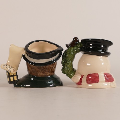 667 - Royal Doulton small character jugs The Angel D7051, The Caroler D7007 & Christmas Robin Snowman D715... 