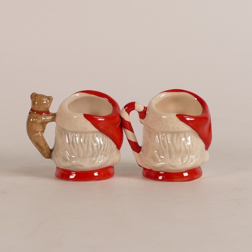 677 - Royal Doulton, four tiny character jugs Santa Claus D7060, 'Santa Claus' D6950, 'Santa Claus' D7020,... 