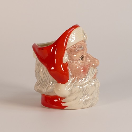 716 - Royal Doulton, two small character jugs Santa Claus 6964 and Santa Claus D6705, with one original bo... 