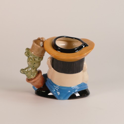 719 - Royal Doulton, two Desperate Dan character jugs. One large, D7006 together with intermediate D7034. ... 