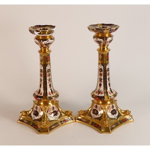 756 - A pair of Royal Crown Derby Imari pattern candlesticks 1128, both A/F