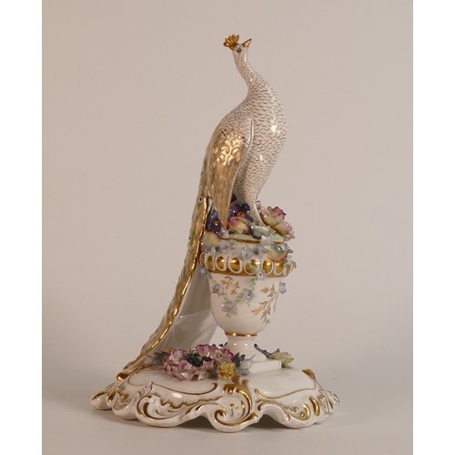 760 - Royal Crown Derby fine quality hand painted porcelain figure of a Peacock - perched on a floral
 enc... 