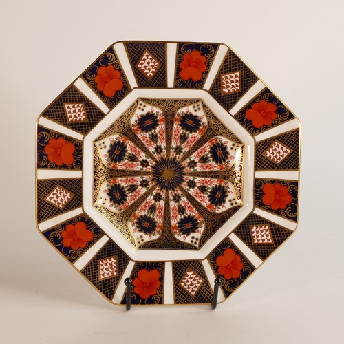 781 - Royal Crown Derby octagonal plate, decorated in the 1128 Old Imari design plus a Dragon paperweight ... 