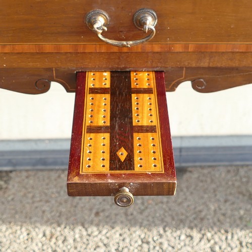 802 - Edwardian inlaid Mahogany fold over games table. Pull out pegboard and table supports. Shaped apron ... 