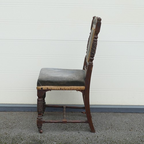 803 - Gillows, Victorian upholstered chair. Deep carved foliate headrest with carved supports and central ... 