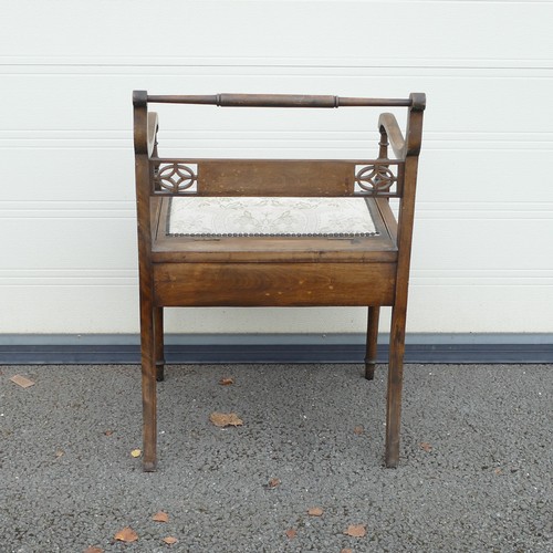 814 - 19th century upholstered Piano stool. Turned top rail on swept arms, splat has marquetry inlaid musi... 