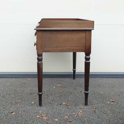 816 - Victorian Writing desk. Surrounding gallery on rectangular top with sloping edge, five drawers below... 