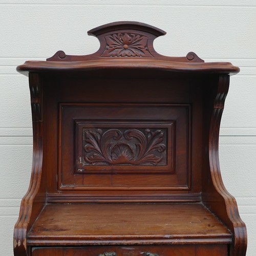 823 - Late Victorian Purdonium coal scuttle. Carved pediment and front panel. Fitted gilt metal handles to... 