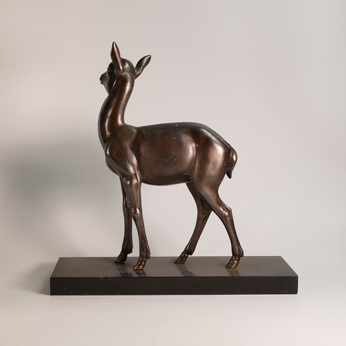 845 - After Irénée Rochard (French, 1906-1984), Bronze model of a Fawn on a black marble base, parcel-gilt... 