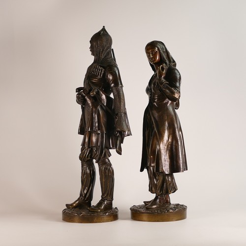 846 - After Eugene L. Lamy (1800-1890). A pair of French patinated bronze orientalist figures of a Turkish... 