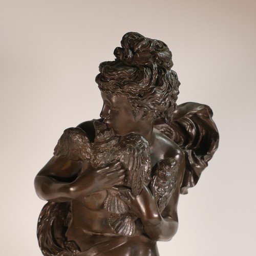 856 - After Albert-Ernest Carrier-Belleuse (1824-1887) A Bronzed figure of a semi-nude female figure clutc... 