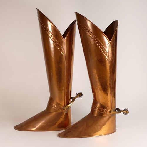 929 - Pair of Brass and Copper stick stands in the form of stirrup boots with spurs. Height: 54cm