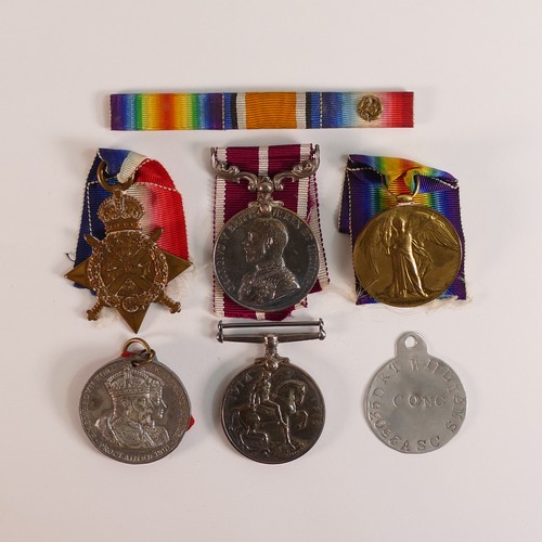 1057 - A collection of First World War WWI medals awarded to T-25035 DVR. T. Williams comprising 