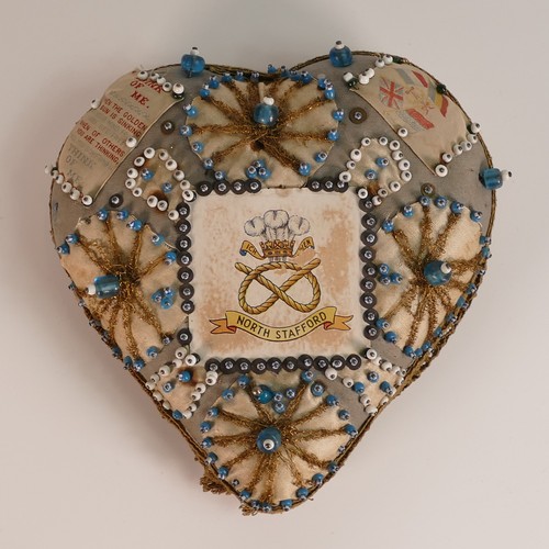 1076 - World War I WWI North Stafford sweetheart pin cushion. Pin and bead decoration, lace trim on large h... 