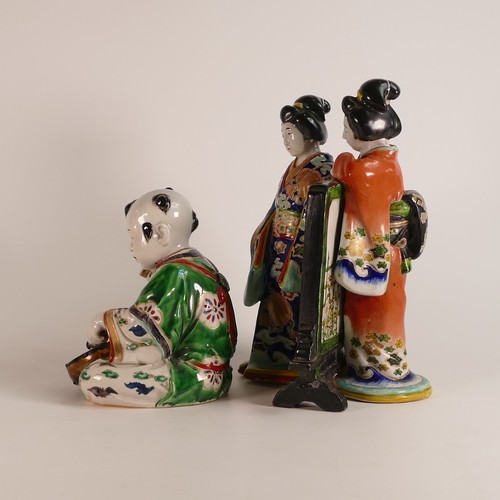 1090 - Two Japanese porcelain Arita style figures of a Geisha and a drummer child. Decorative in raised ena... 