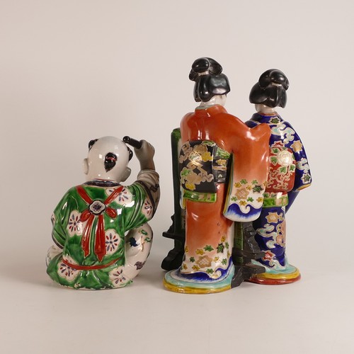 1090 - Two Japanese porcelain Arita style figures of a Geisha and a drummer child. Decorative in raised ena... 