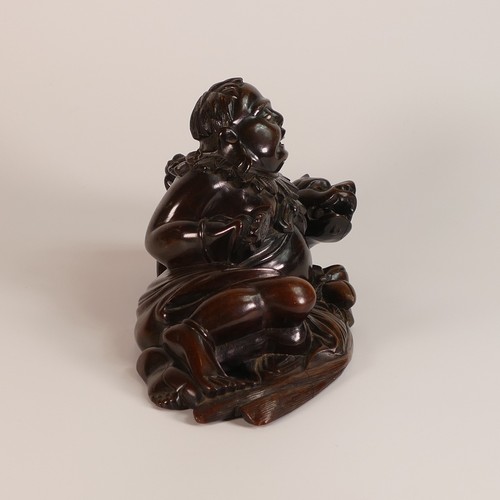 1112 - Chinese carved hardwood figure of reclining Buddha with mythical horned beast under his left arm. My... 