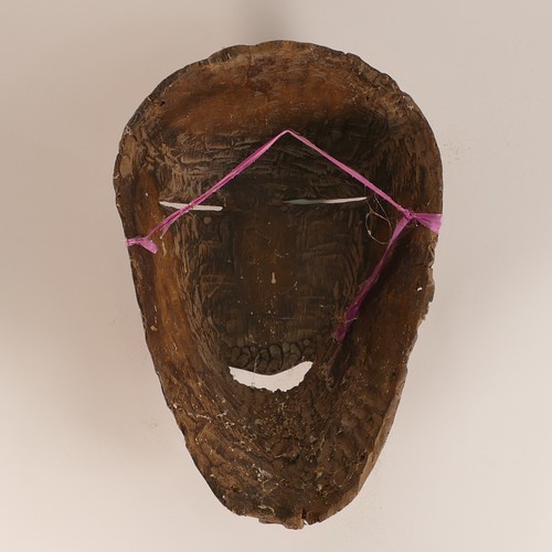 1113 - African Tribal mask with holding handle below. Height: 37cm