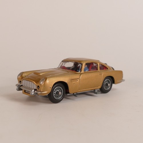 1124 - Corgi, 261 James Bond 007 Aston Martin D.B.5. In original box with display stand and 'secret instruc... 