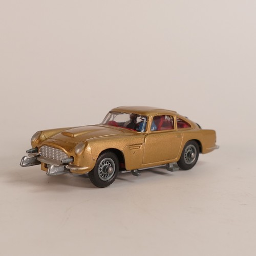 1124 - Corgi, 261 James Bond 007 Aston Martin D.B.5. In original box with display stand and 'secret instruc... 