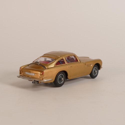 1124 - Corgi, 261 James Bond 007 Aston Martin D.B.5. In original box with display stand and 'secret instruc... 