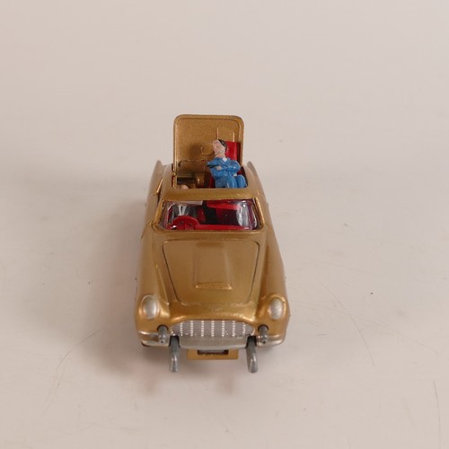 1124 - Corgi, 261 James Bond 007 Aston Martin D.B.5. In original box with display stand and 'secret instruc... 