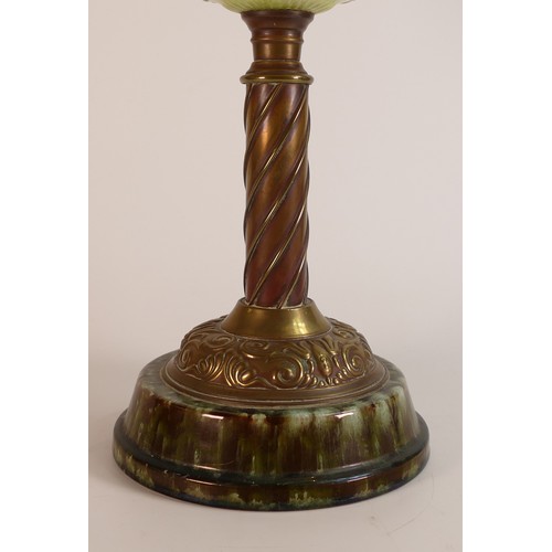 1125 - Late 19th century Oil lamp. Base is of mottled earthenware with brass twist shaft below a lime milk ... 