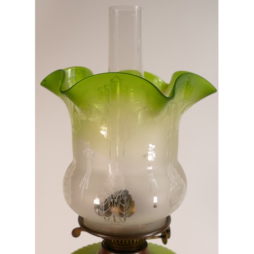 1125 - Late 19th century Oil lamp. Base is of mottled earthenware with brass twist shaft below a lime milk ... 