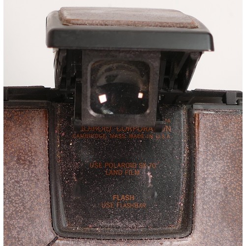 1127 - Polaroid SX-70 Land Camera Model 2 in original leather fitted case with accessories and ephemera.